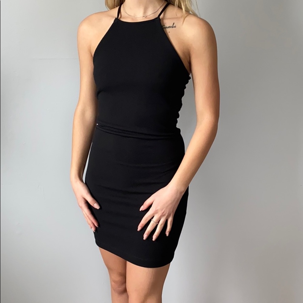Tight black halter dress